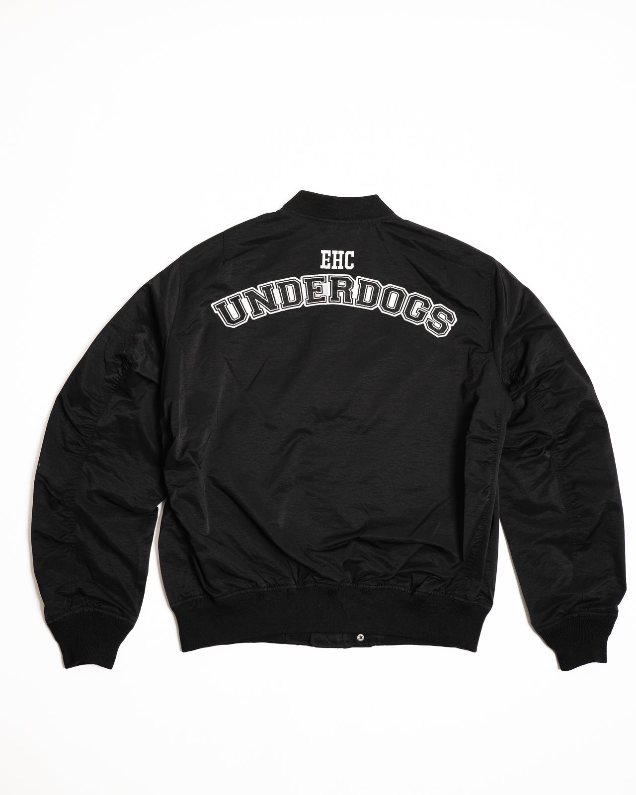 Every Hustle Counts EHC Underdogs black bomber jacket, back view with arched EHC Underdogs print