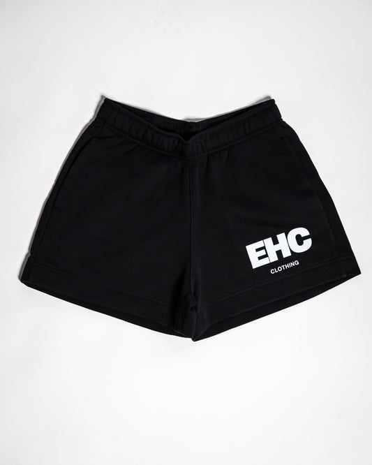Every Hustle Counts EHC World black womens shorts with white EHC leg print